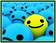 Rosto sorridente amarelo entre rostos tristes azuis, no artigo A Inteligência Emocional de Carlos Cardoso Aveline.