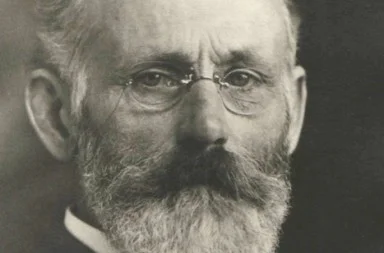 Black and white historical portrait of theosophical writer Robert Crosbie, illustrating the article Mercy and the Law of Karma.