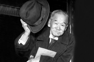 Judo founder Jigoro Kano lifting his hat, illustrating moral strength in Judo and Theosophy.
