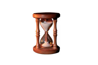 A classic wooden hourglass with light sand flowing between its glass bulbs, representing time and the core themes found in A Psalm of Life, isolated against a solid white background.