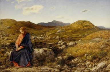 The painting Man of Sorrows by William Dyce showing Jesus Christ with long brown hair wearing an orange and dark blue robe sitting in reflection on a rock in a vast barren desert landscape under a cloudy sky.