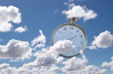 A clock floating between blue sky and clouds, symbolizing the passage of time and mortality in Shakespeare's Seven Ages of Man.